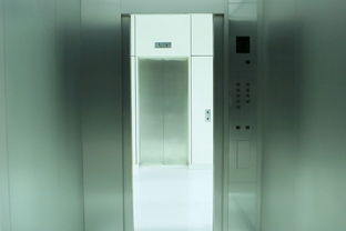 1吨的乘客电梯电机功率是多少